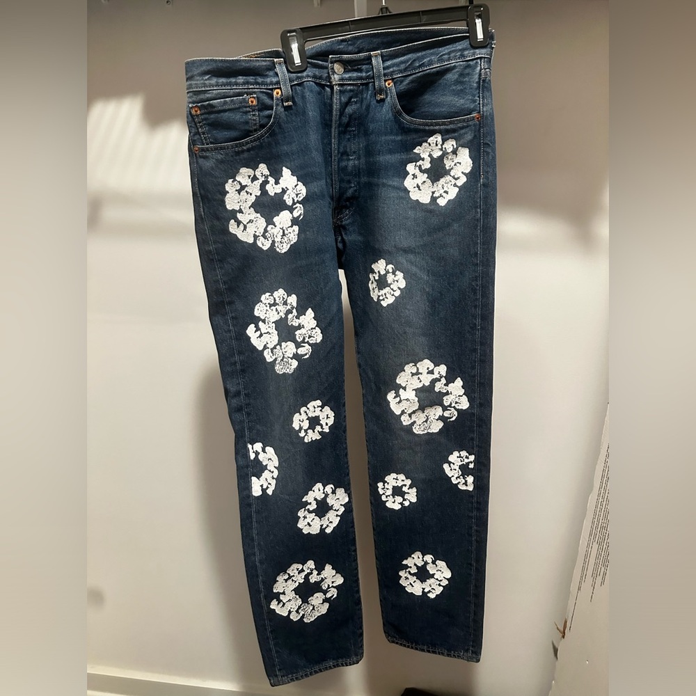 Denim tear light wash jeans
